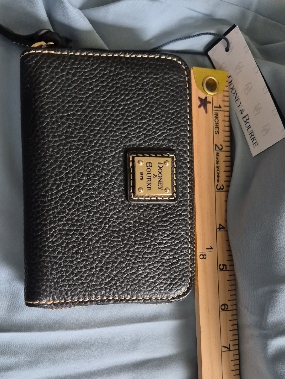 Dooney & Bourke Black Pebbled Leather Zip Card Holder with Gold Logo Plate